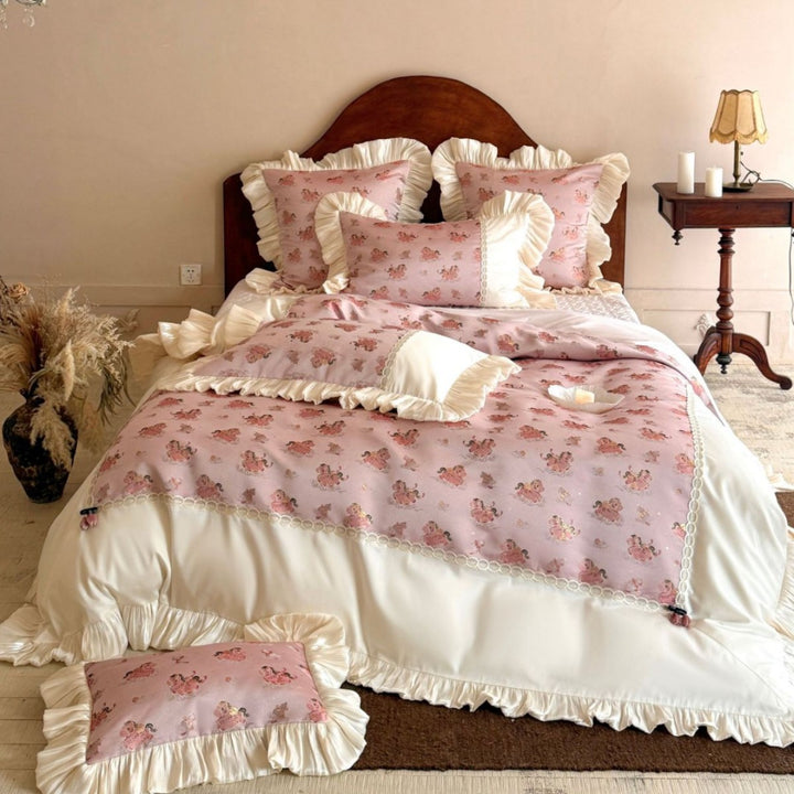 Romantic bed linen set with ruffles, lace border, and vintage print