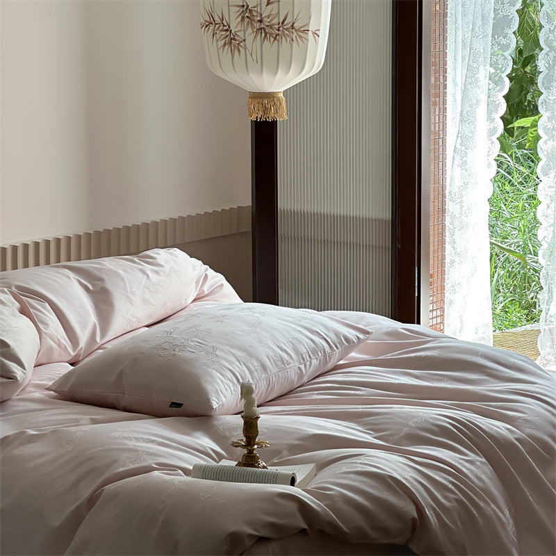Luxurious cotton satin bedding set with fine jacquard floral relief and silky finish