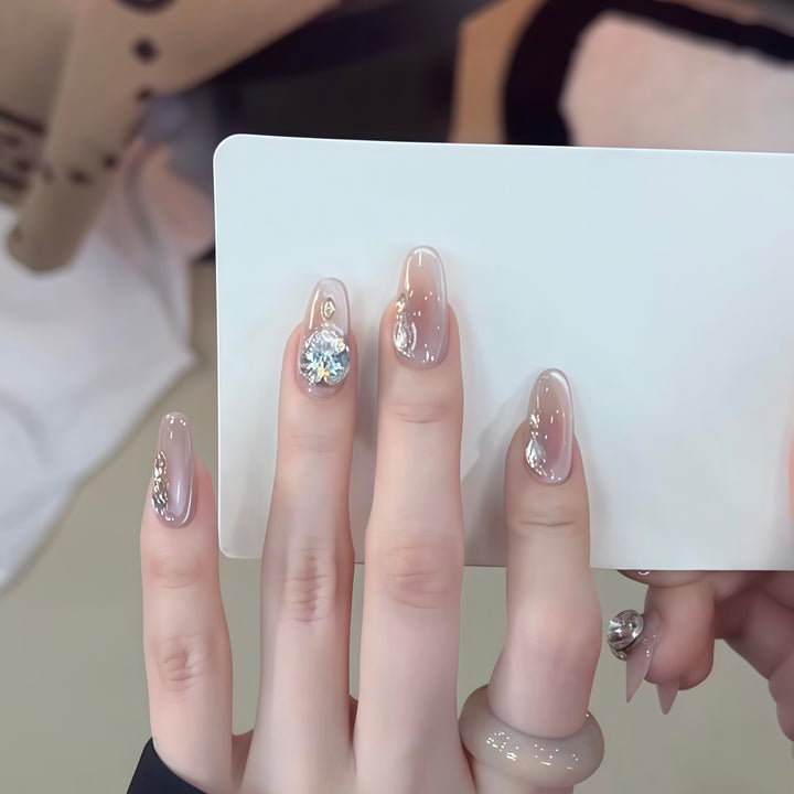 Glamorous artificial nails with rhinestone embellishments Kalsten