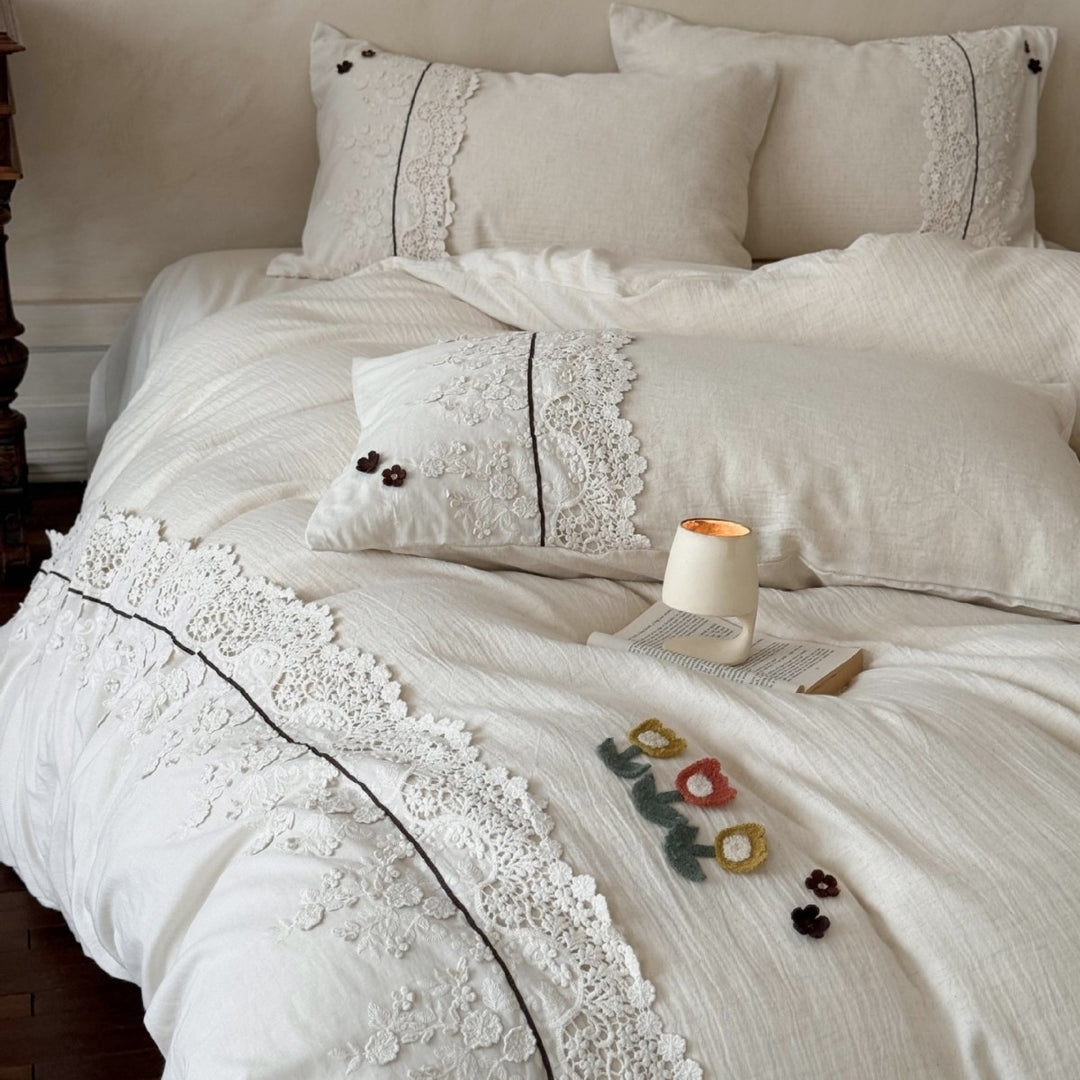 Bedding set in linen look with embroidered lace border and fine embroidery