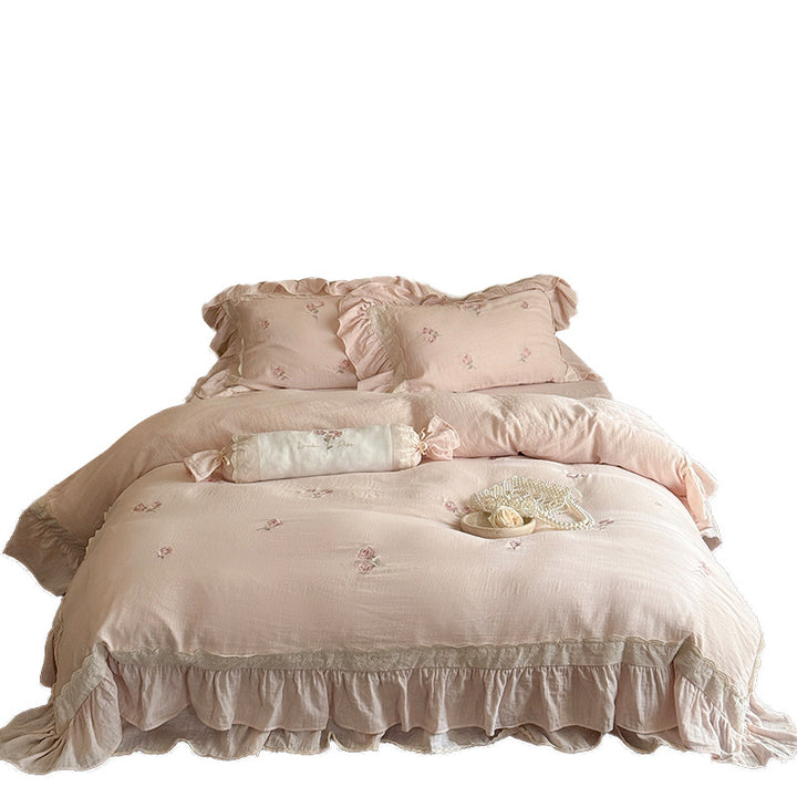 Romantic bedding set made of linen-cotton blend with ruffles and floral embroidery