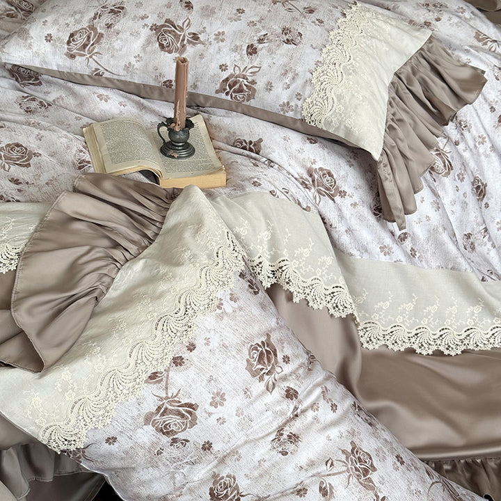 Elegant bedding set in vintage romantic style with lace applique, ruffle, and satin edging