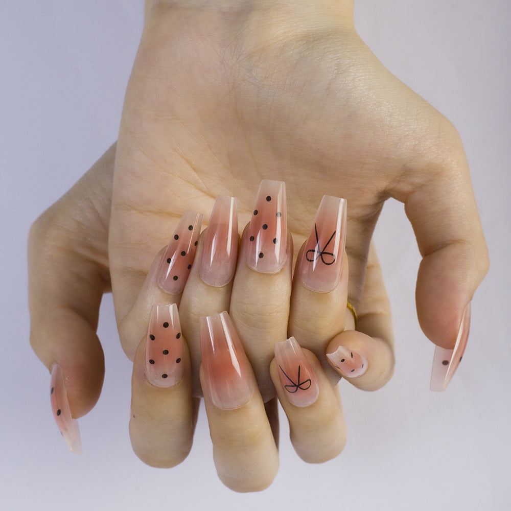 Artificial nails with modern dot design and elegant accents Kalsten