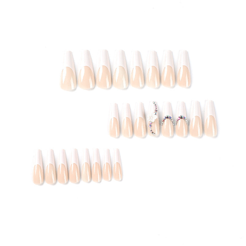 Creative artificial nails with elegant rhinestone and floral accents Kalsten