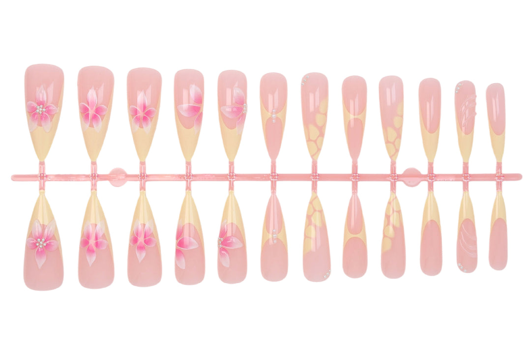 Acrylic nail set with elegant floral pattern and shimmering accents Kalsten