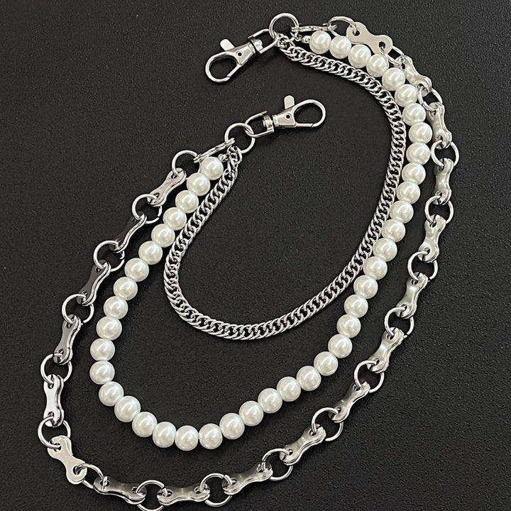 Fashionable chain bracelet with pearls and metal links Kalsten