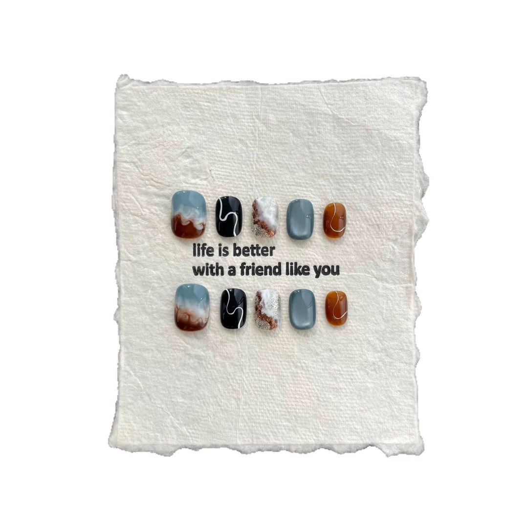 Artistic Press-On Nail Set with Stunning Marble Effect