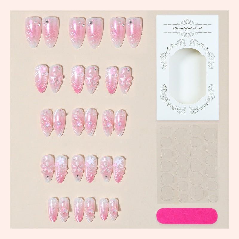 Acrylic nail set with elegant flower design and glitter accents Kalsten
