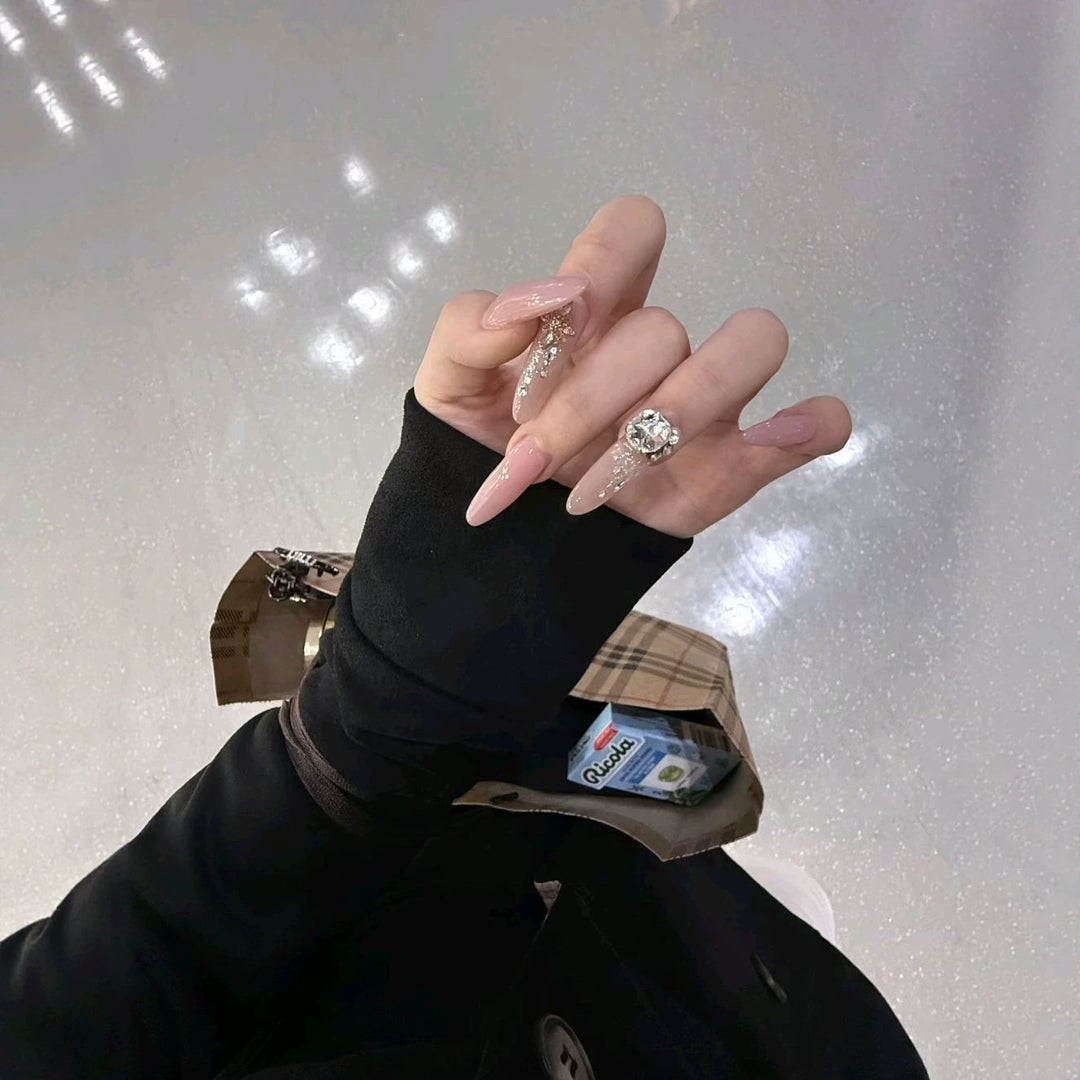 Elegant Stiletto Nail Extensions with Crystal Accents