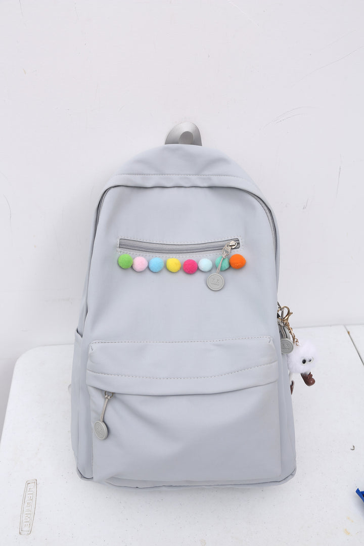 Practical backpack with colorful applications Kalsten