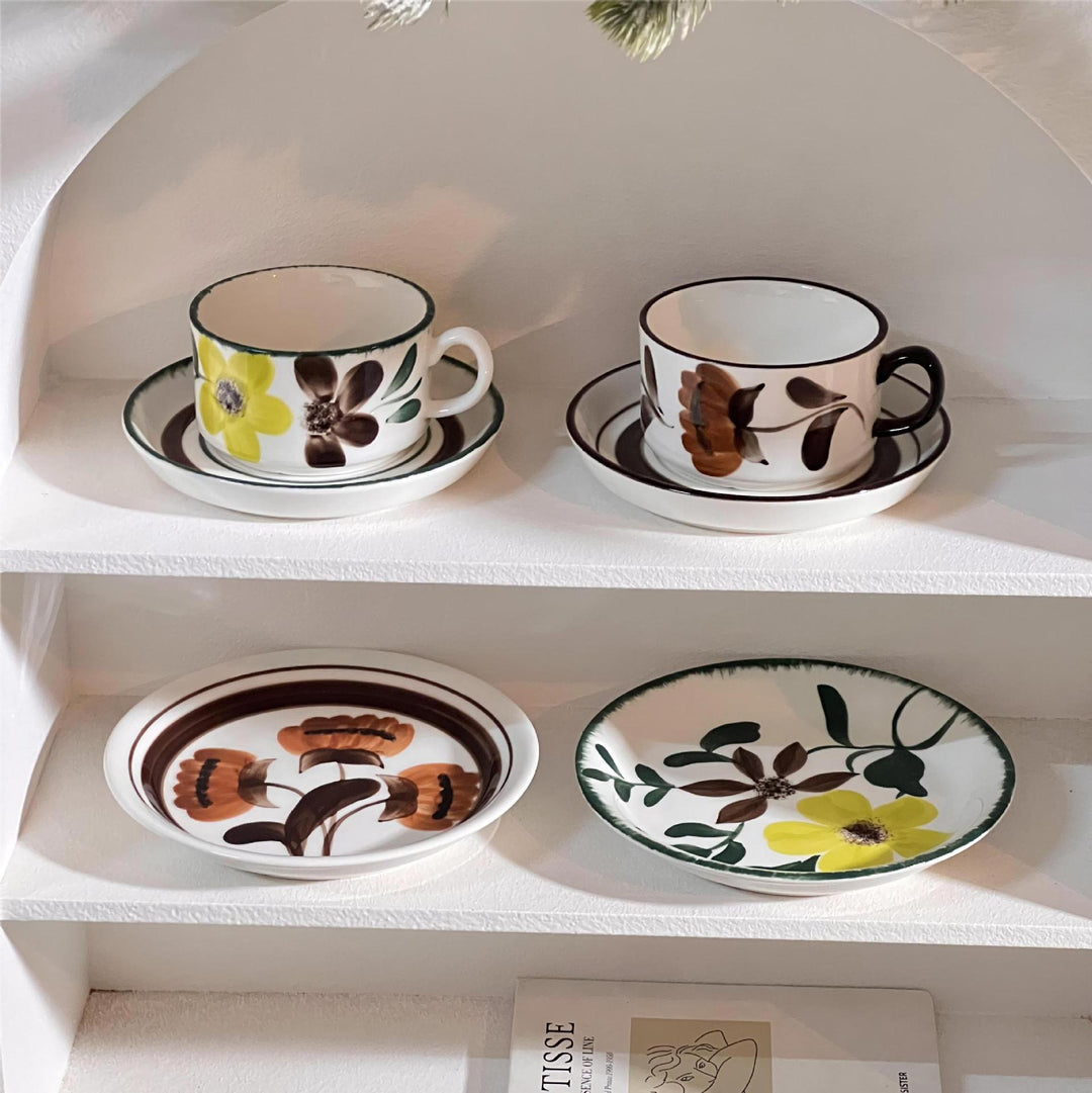 Porcelain cappuccino set with botanical brush painting and elegant rim decoration