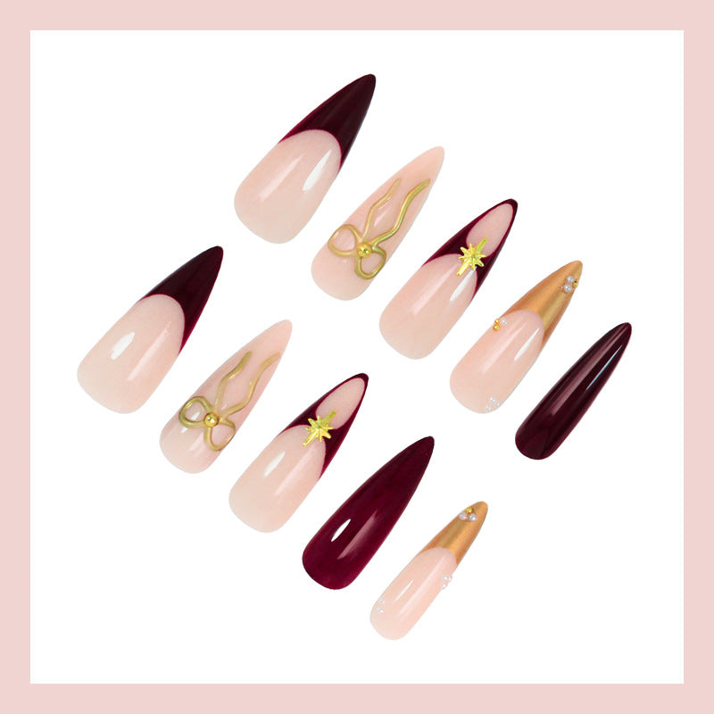 Artificial nail set with glamorous gold accents and elegant tips Kalsten