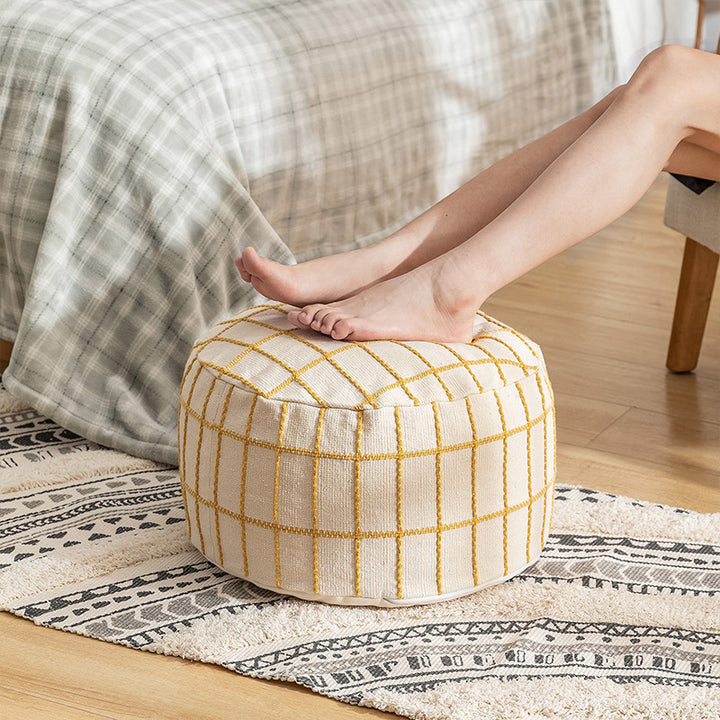 Beef padded seat pouf with embroidered check pattern and cotton cover