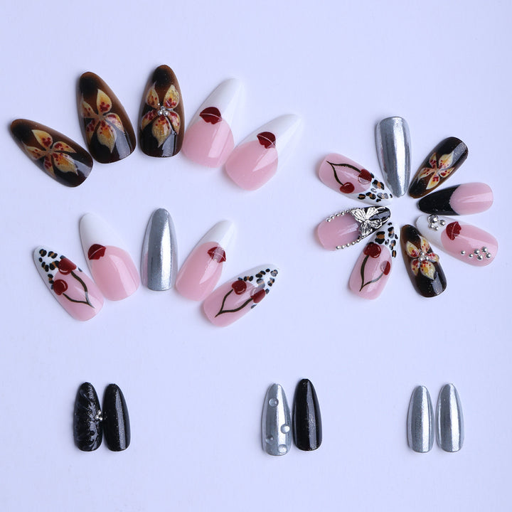 Artful Stiletto Fingernails with Unique Design Elements Kalsten