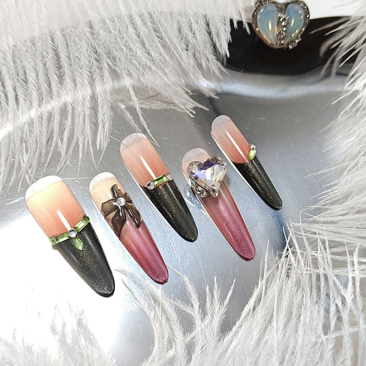 Artificial nails with elegant tip design and glitter accents Kalsten