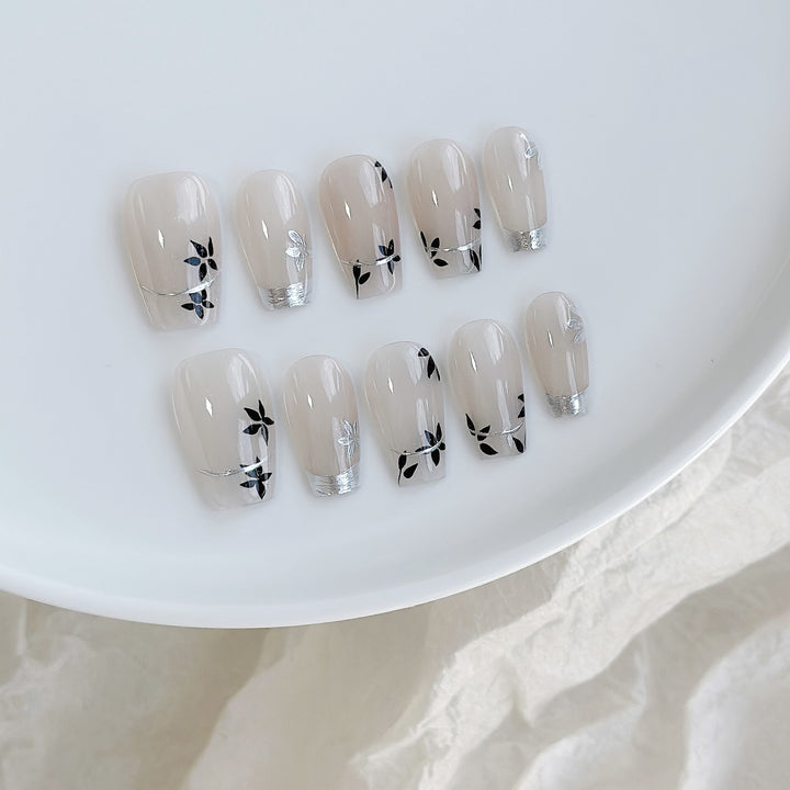 Artistic Press-On Nail Art Set with Heart and Celestial Designs