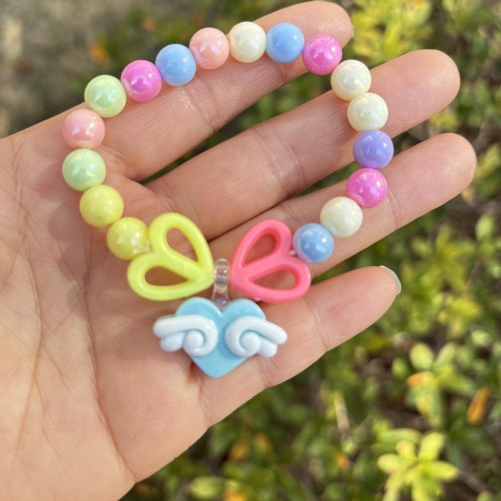 Colorful bracelet with flower charms Kalsten