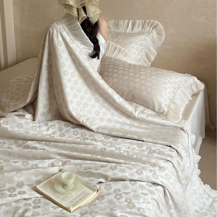 Satin comforter set with pleated ruffles and fine jacquard floral texture