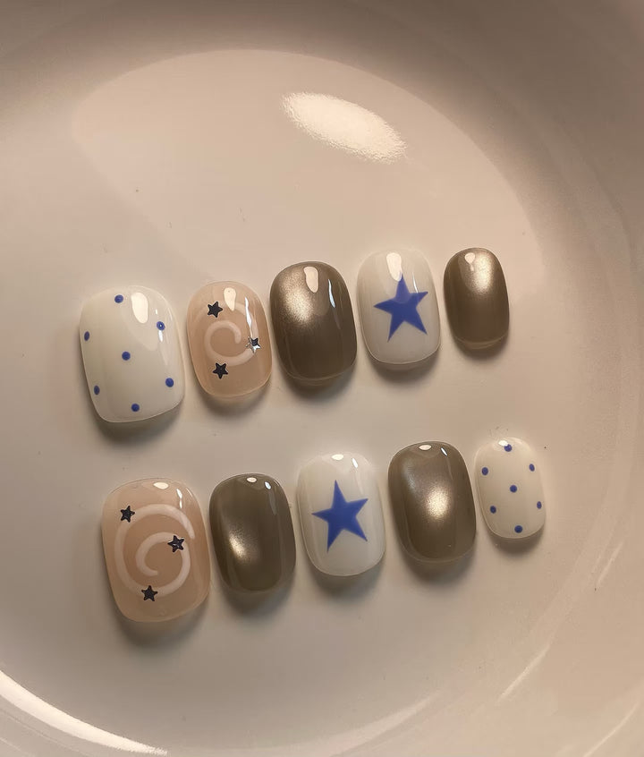 Artistic Press-On Nail Set with Whimsical Star and Dot Designs