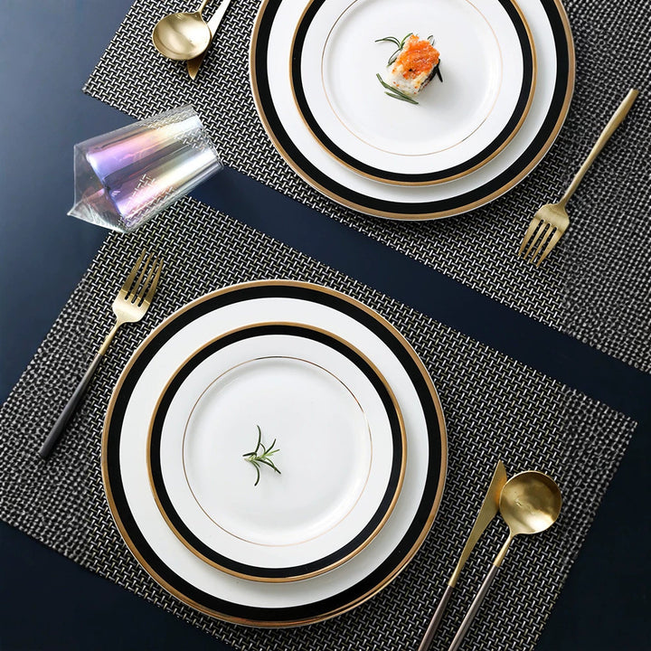 Porcelain plate with fine metal rim decoration and contrasting decorative ribbon