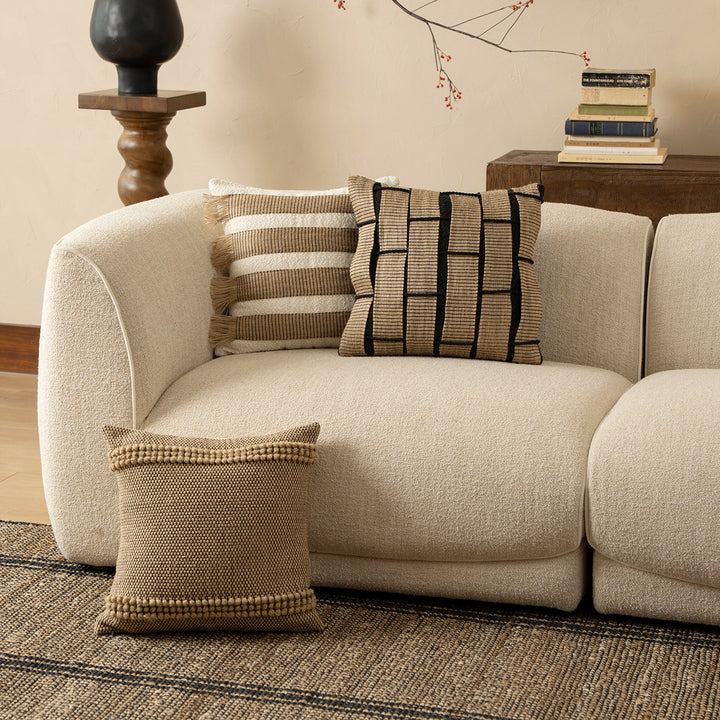 Decorative cushion cover made of woven cotton blend with structured checkered look