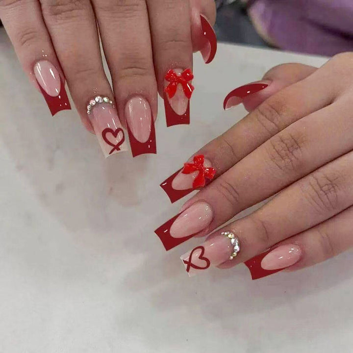 Artistic Press-On Nail Set with Heart and Bow Designs