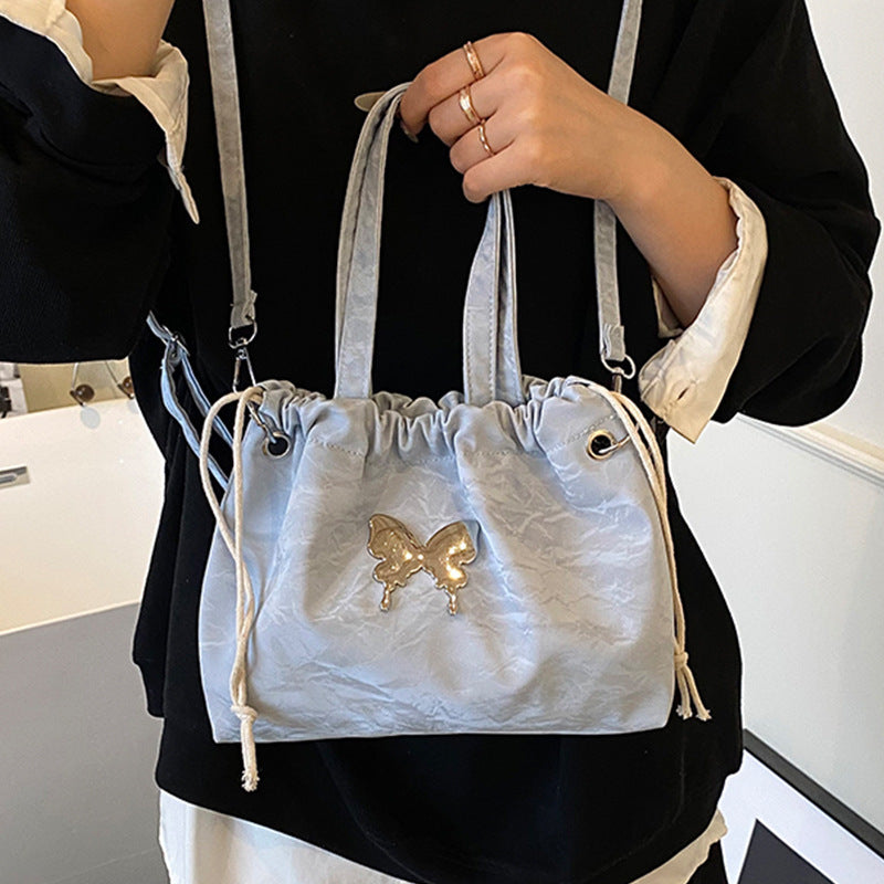 Elegant Pearl-Accented Mini Drawstring Handbag