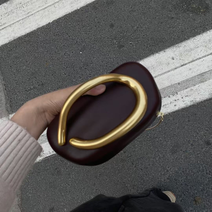 Statement Clutch with Sculptural Handle Kalsten