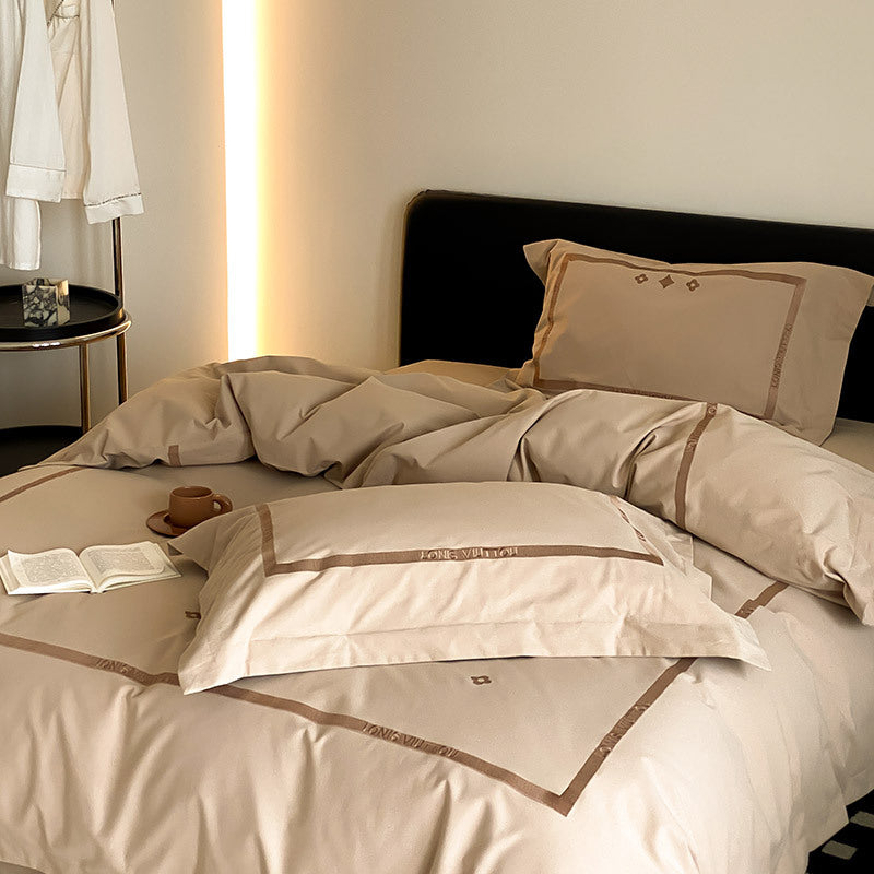 Luxurious cotton satin bedding set with embroidered border edge