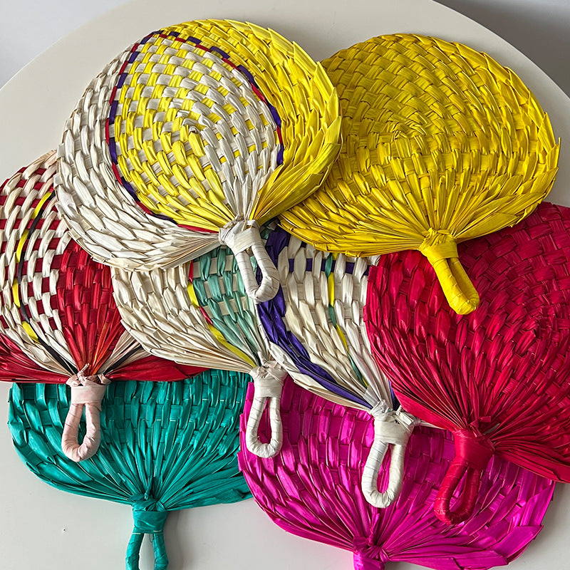 Women hand-woven fan made of natural material Kalsten