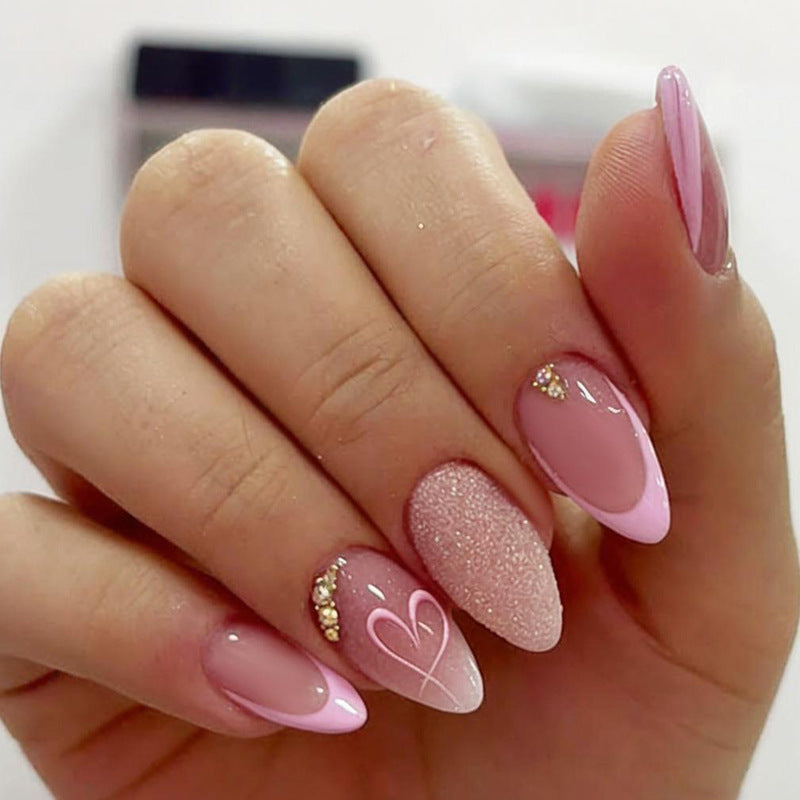 Artificial nail set with delicate glitter and heart designs Kalsten