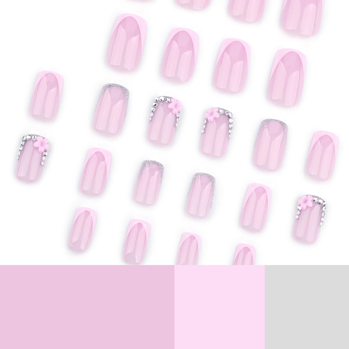 Artful gel nails with elegant floral design and glitter accents Kalsten
