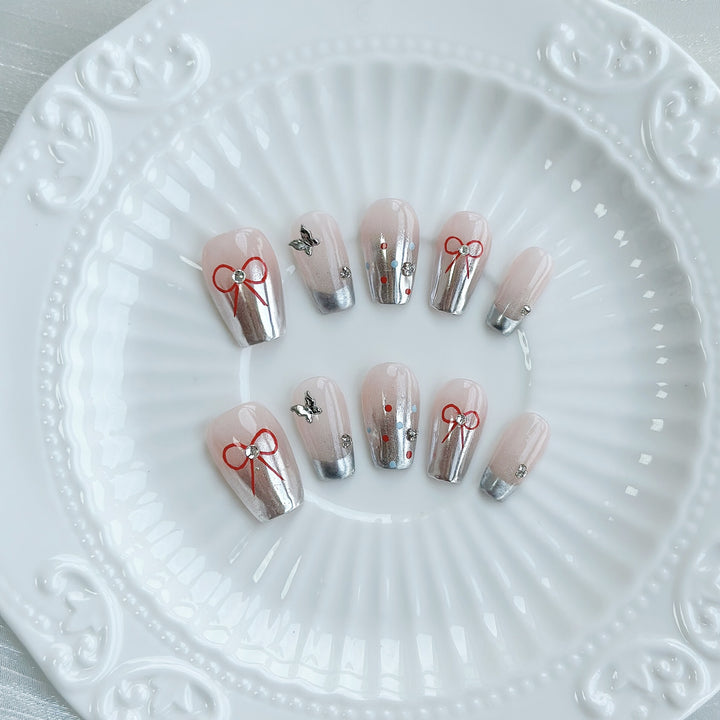 Artistic Press-On Nail Art Set with Bow and Gem Details