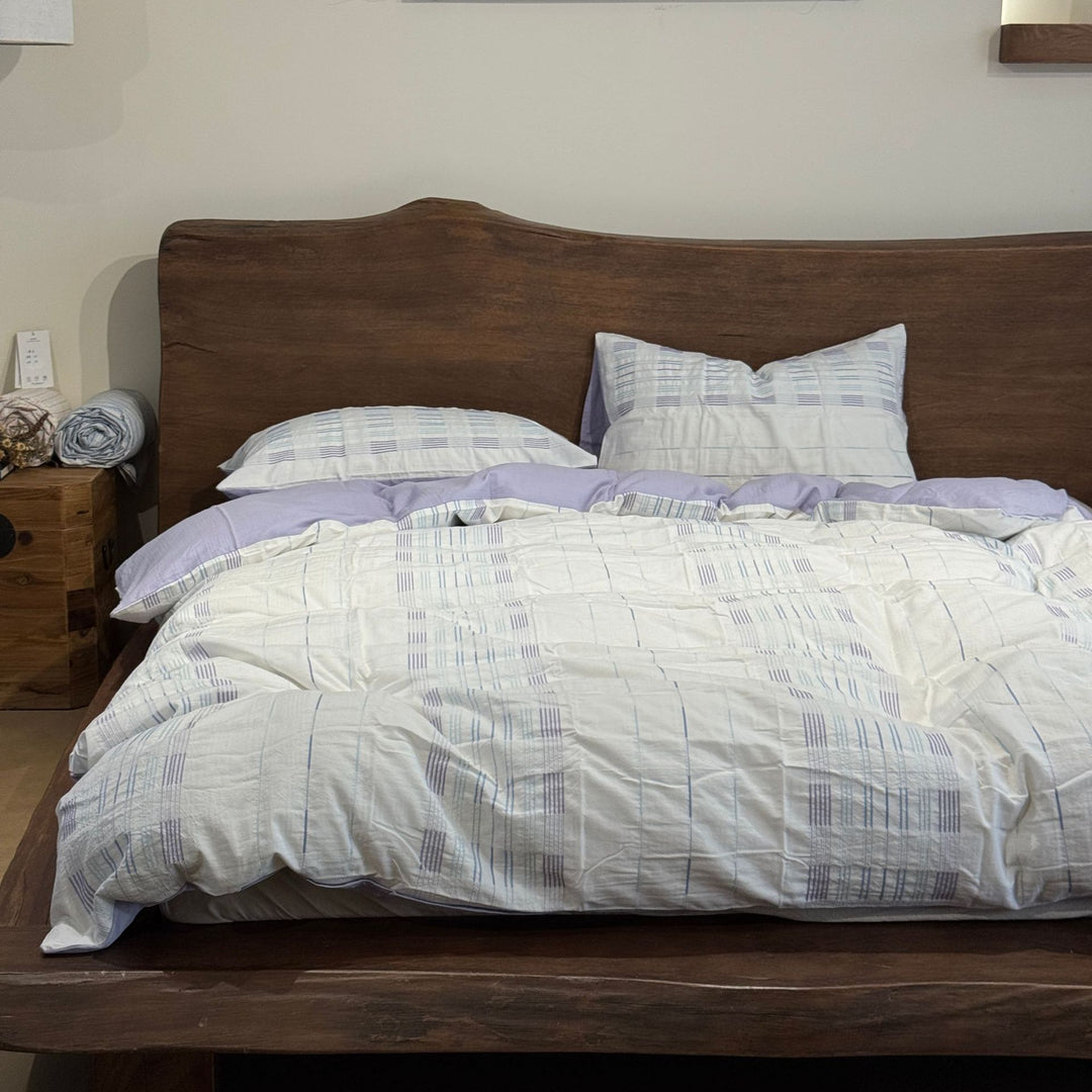 Cotton percale bedding set with a light quilted texture and subtle striped texture