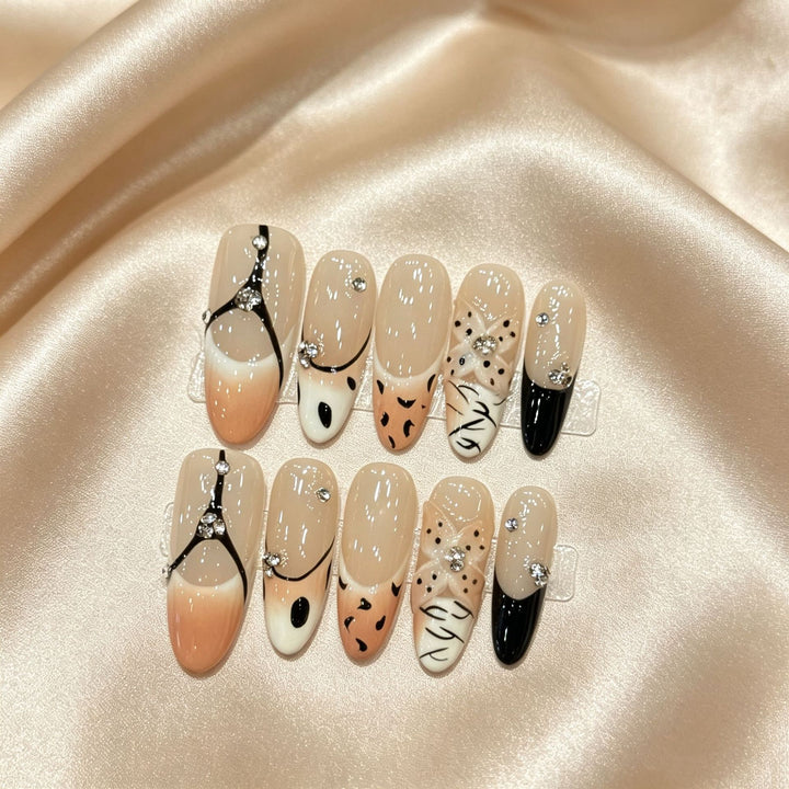 Artistic Press-On Nail Art Set with Elegant Designs