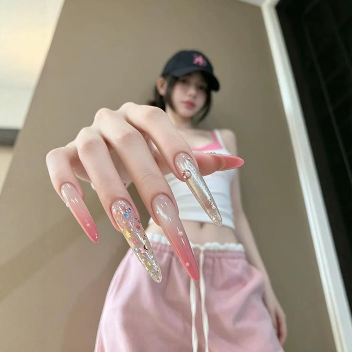 Elegant Stiletto Nail Extensions with Rhinestone Accents