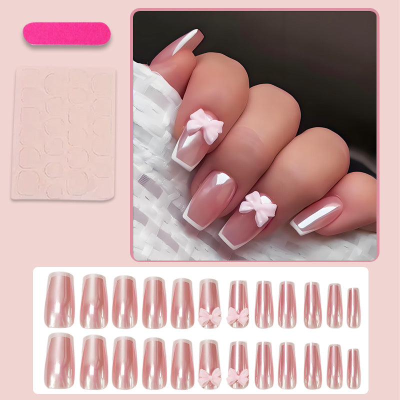 Artificial nail set with stylish bows and elegant French tips Kalsten