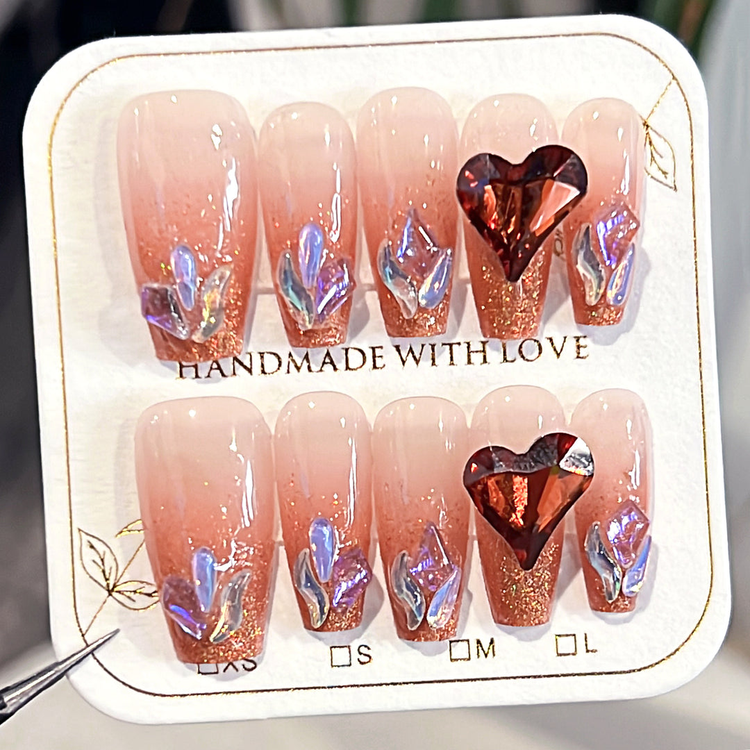 Artistic acrylic nails with heart design and sparkling accents Kalsten