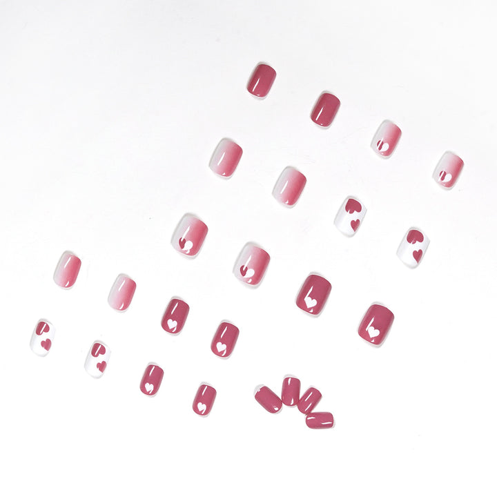 Creative nail art with heart motif and high-gloss finish Kalsten