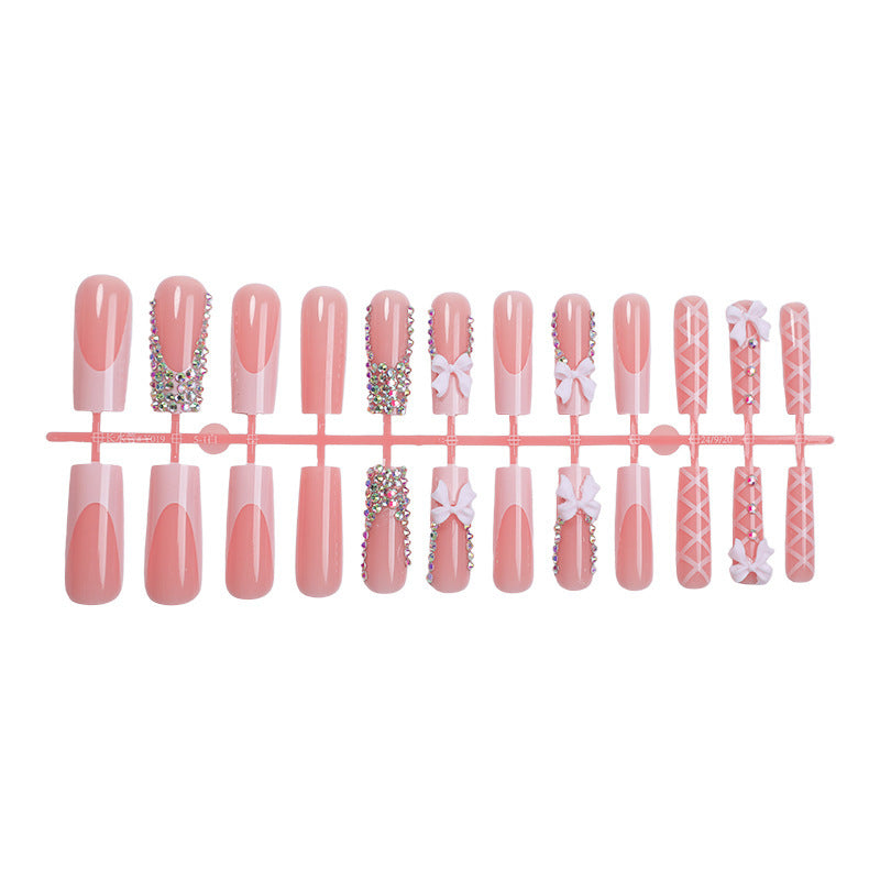 Artificial nail set with elegant bow and glitter accents Kalsten
