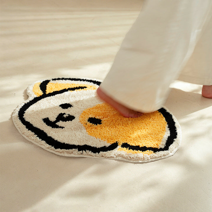 Playful children's room rug in cheese shape with soft tufting and non-slip backing