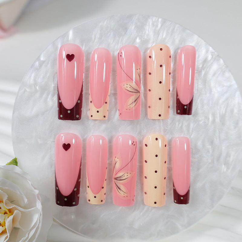 Acrylic nail set with elegant floral and polka dots design Kalsten