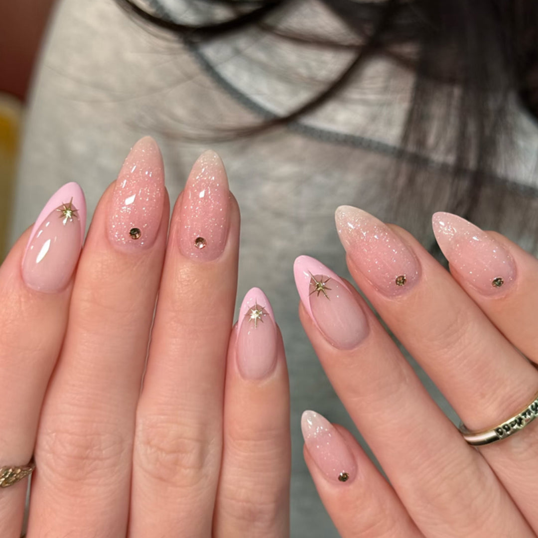 Artistic nail design with glitter and star accents Kalsten
