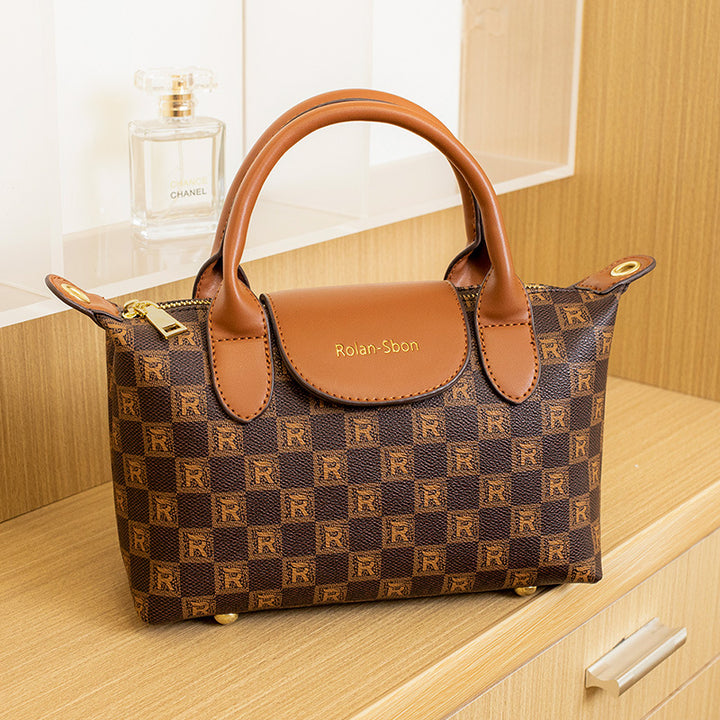 Elegant Designer Handbag with Structured Design