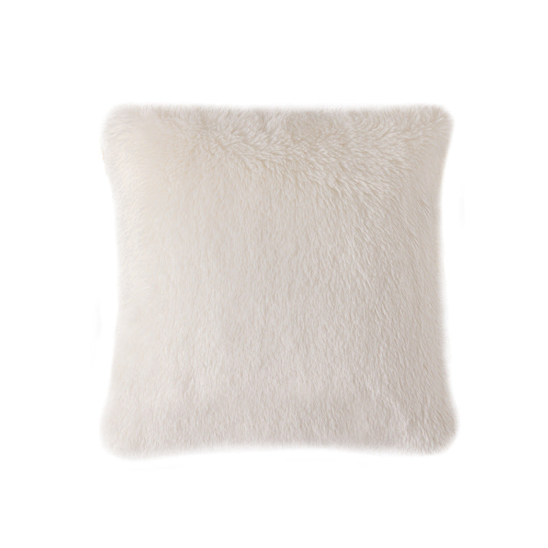 Square decorative cushion made of soft faux fur with inner cushion