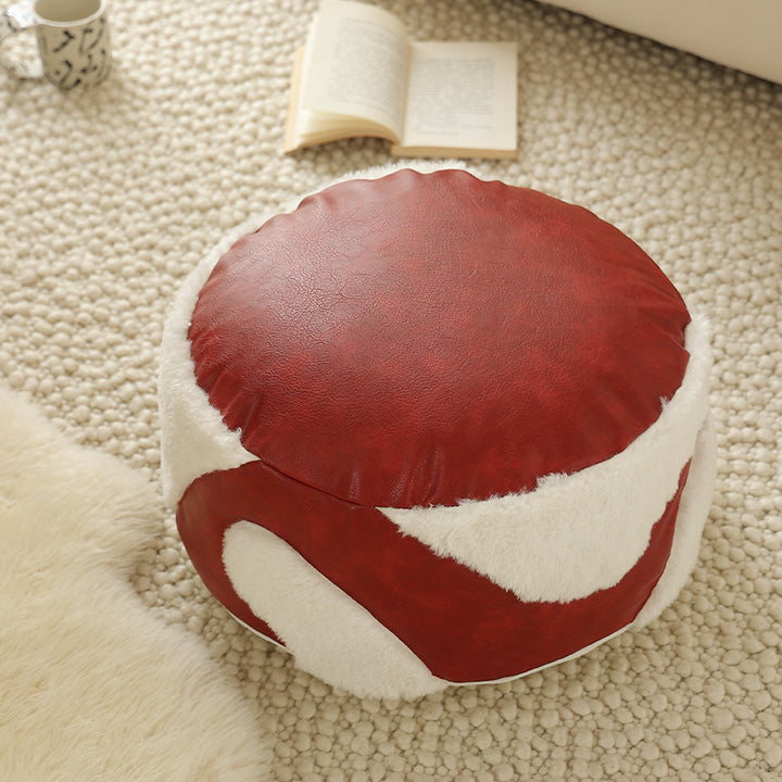 Round seating pouf with faux leather cover and Sherpa applications