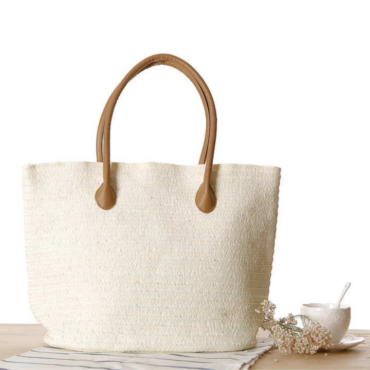 Spacious straw shopper with leather carrying handles Kalsten