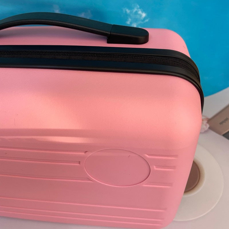 compact hardshell travel carry case with top handle and reinforced ridged shell Kalsten