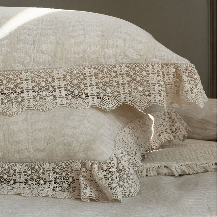 Natural linen bedding set with lace edge and decorative neck roll