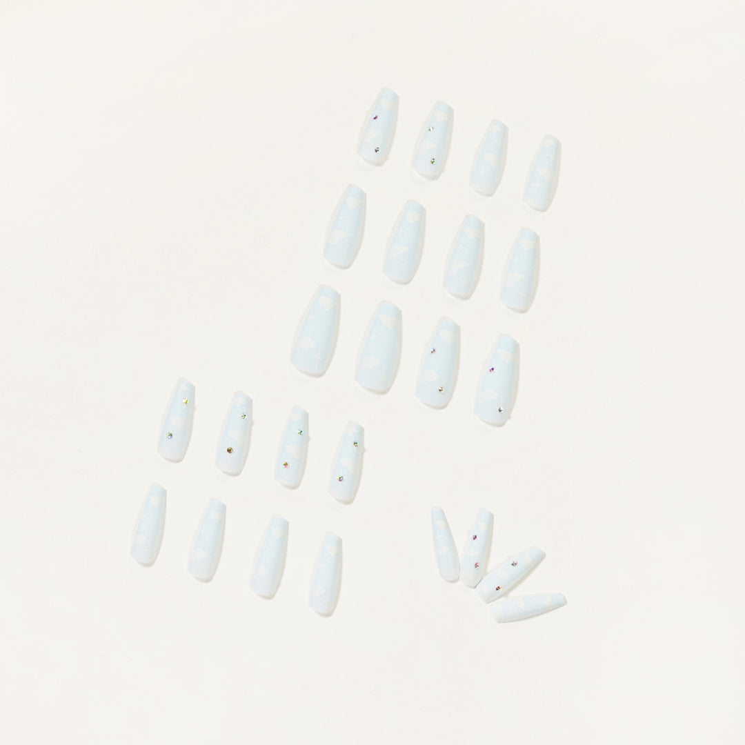Creative nail art in cloud design with glitter accents Kalsten